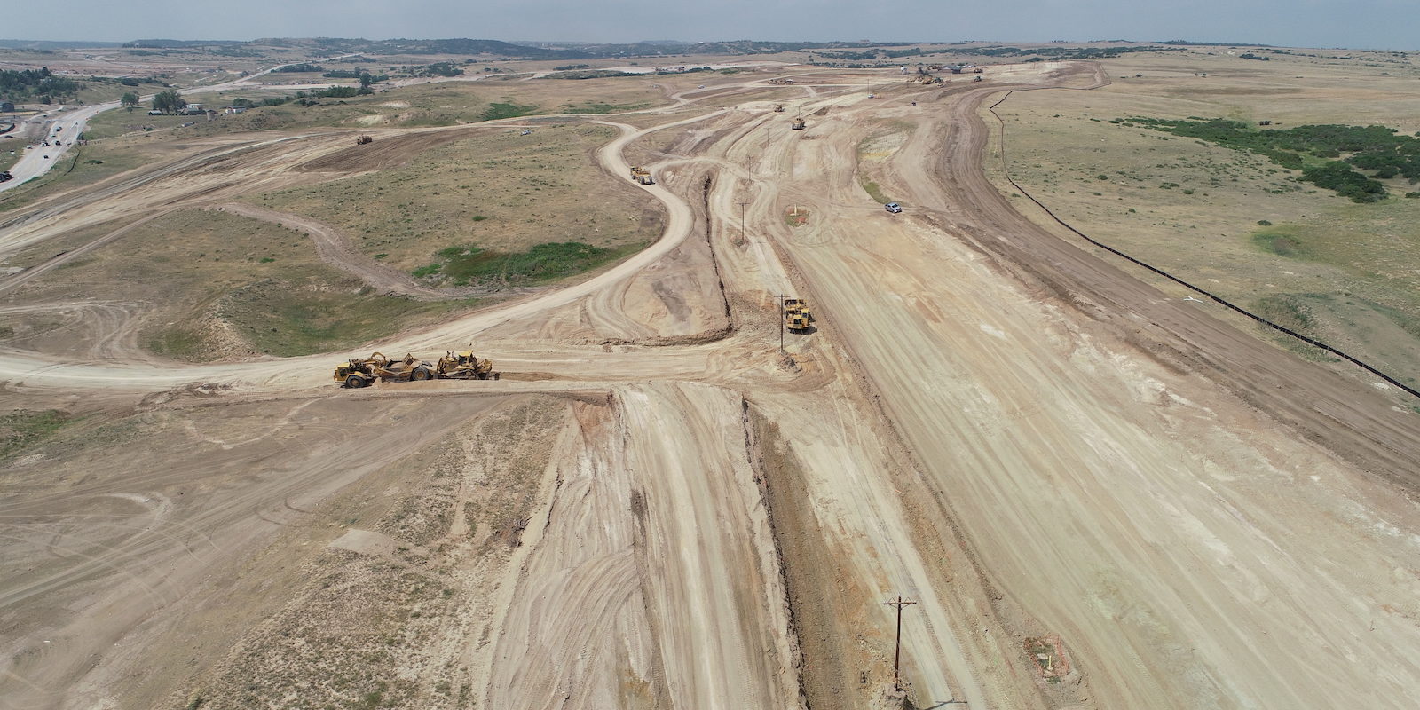 Aerial View Of Bemas Construction Constructing Arterial Roadway For Looking Glass Residential Project